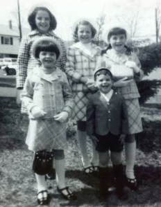 When we were five: that's me, the tallest, in my patriotic Easter outfit circa 1970.  My youngest sister had not yet arrived.
