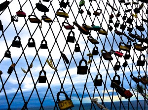 "Love locks" on a fence erected to prevent suicides high over the Adriatic Sea in Dubrovnik, Croatia.